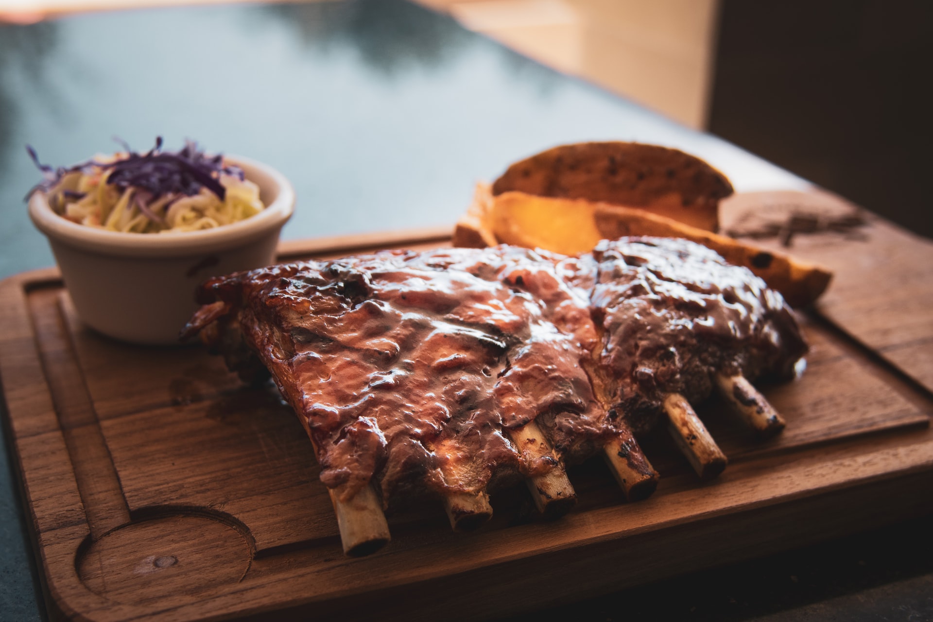 rack of ribs on wood board